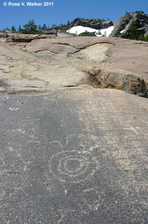 Concentric circles and other faint petroglyphs at Donner Pass, California. 
