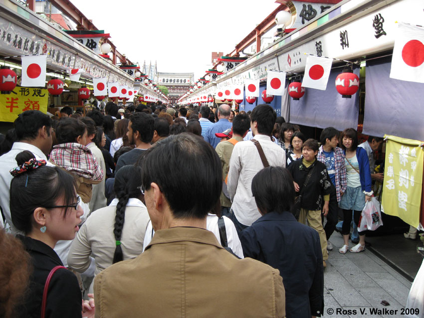 Crowds and vendors on Nakamise Street, Tokyo, Japan