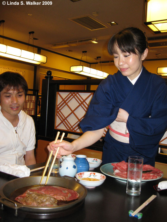 Sukiyaki is cooked at the table in a Tokyo restaurant