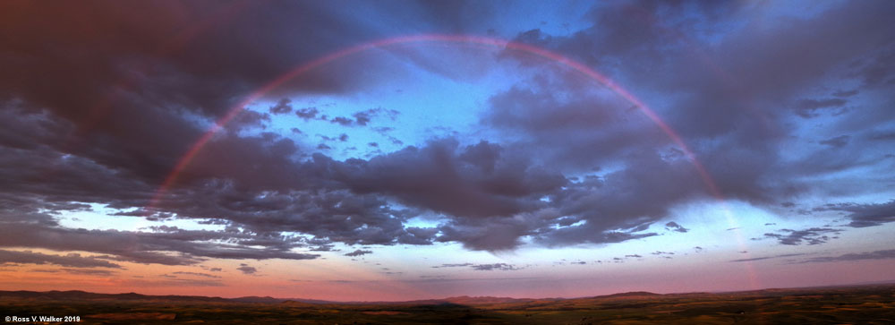 A faint rainbow at sunset from Steptoe Butte, Washington.