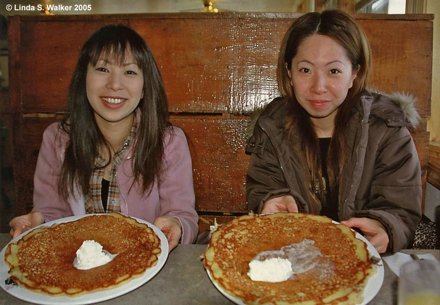 Tiny girls with huge pancakes at the Ranch Hand, Montpelier, Idaho