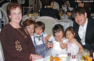 Linda with children at wedding