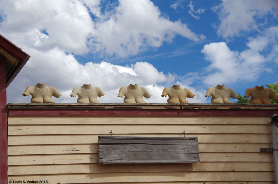 Busts on the roof of the Tuscarora Summer Pottery School, Tuscarora, Nevada.