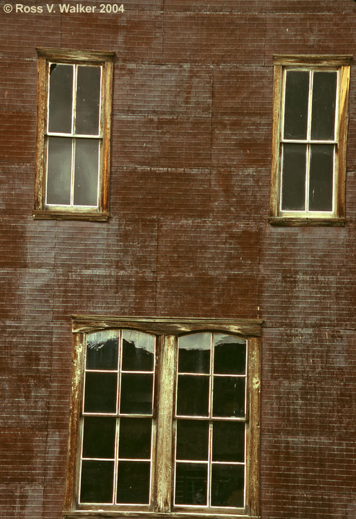 Ghost town windows in the Meade Hotel, Bannack, Montana