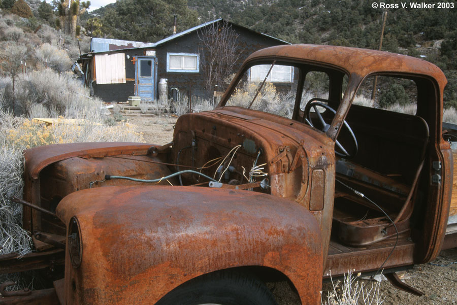 Rusty truck and abandoned house in Sylvania, California / Nevada border.