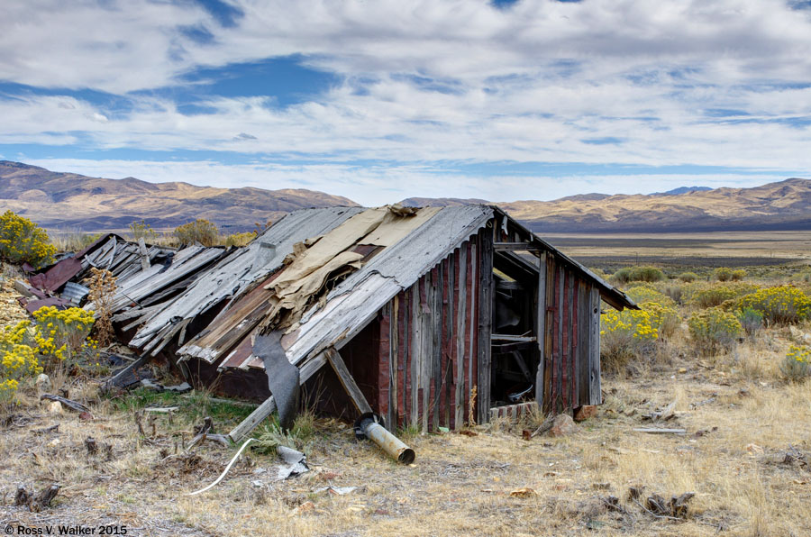A long, low barn on the edge of town at Tuscarora, Nevada