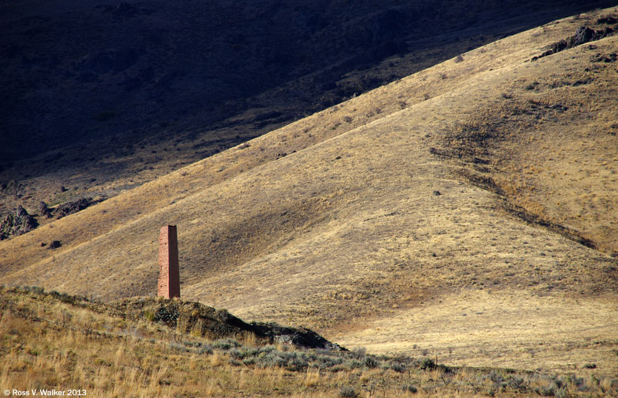 The chimney of the old Independence mill high above Tuscarora, Nevada