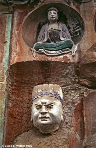Buddha and carved head, Dazu, China