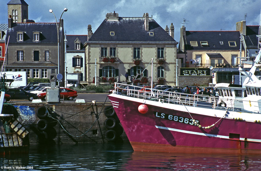 Fishing boat and Le Guilvinec waterfront from Treffiagat, Brittainy, France