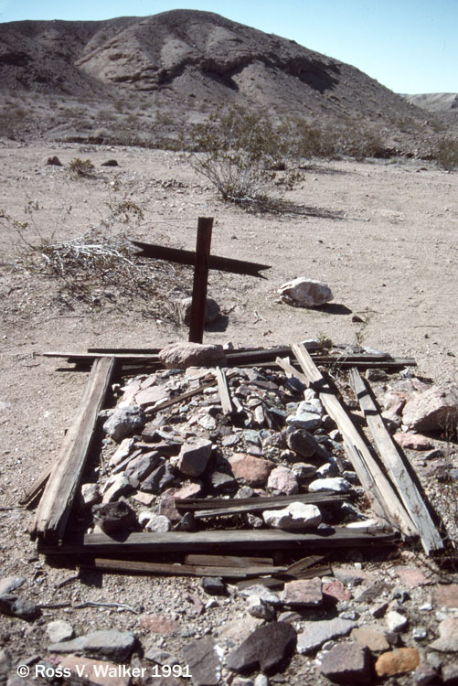 A lonely, unidentified grave on a Mojave Desert hillside, Afton Canyon, California