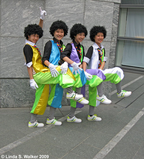 Kids dancing near Hamarikyu Garden, Tokyo, Japan