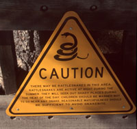 Caution, rattlesnakes sign