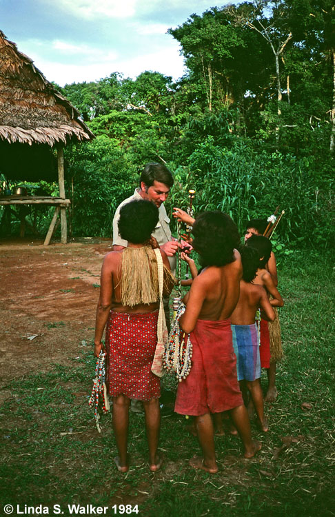 Bora Indians trading with a tourist, Amazon jungle, Peru