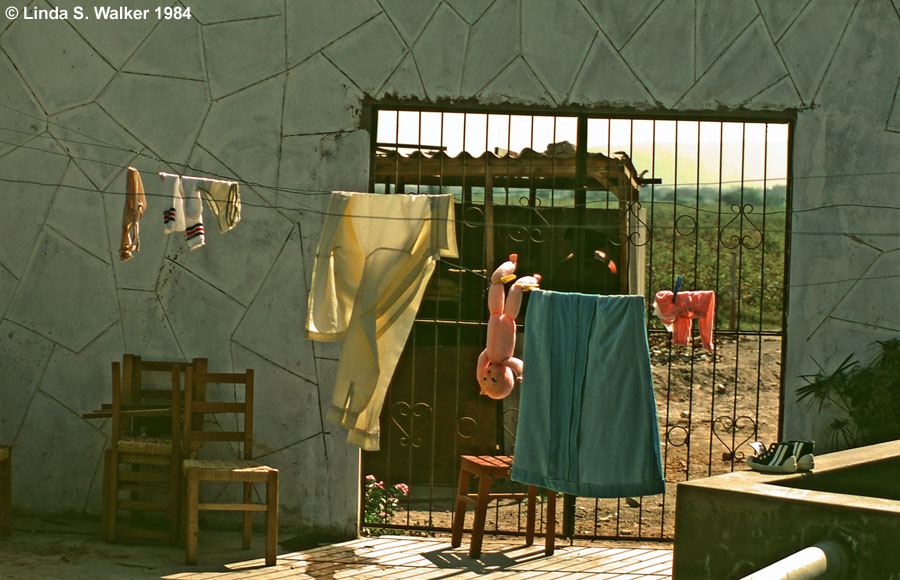 Laundry and a doll hung out to dry, Nazca, Peru