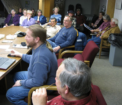 Dave Olsen, from Star Valley, Wyoming, shows his photos to club members. 