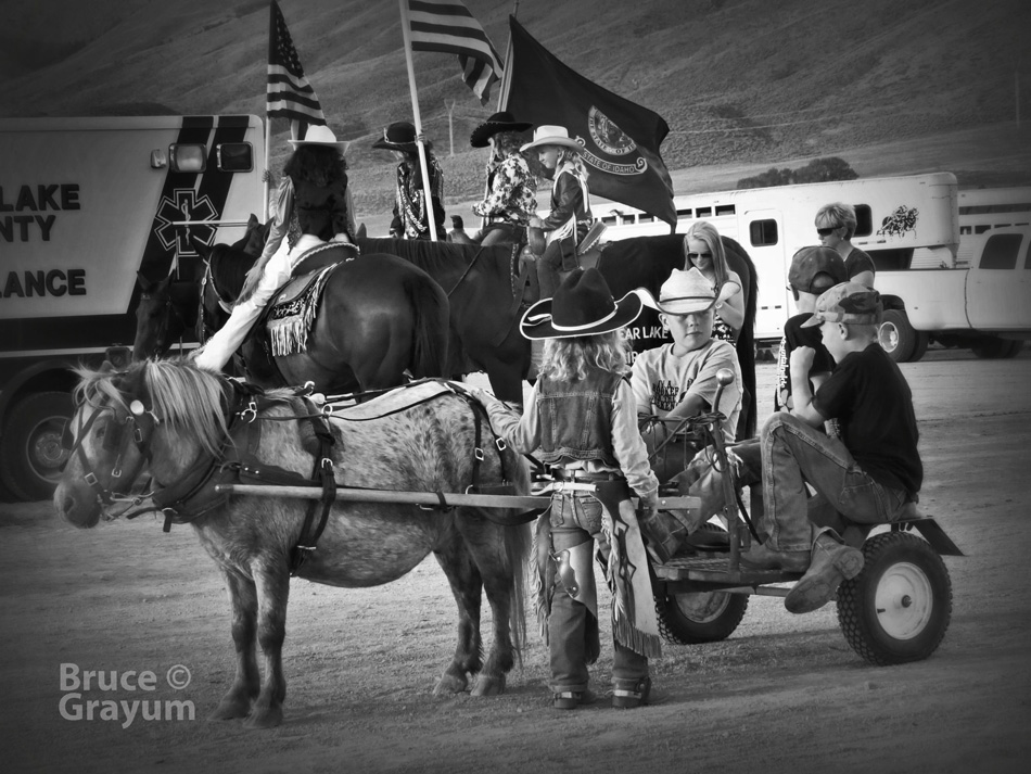 Rodeo kids on a horse cart