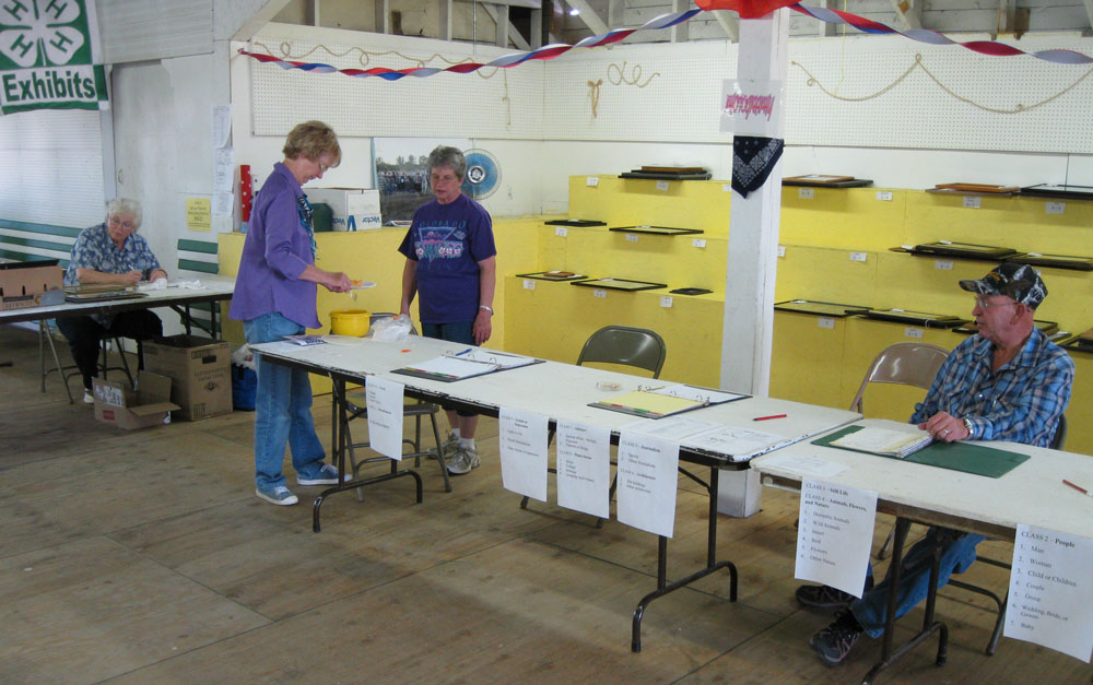 Sharp Shooters members manage the photography at the Bear Lake County Fair