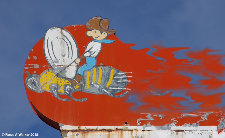 Busy bee on the Cowboy Oil sign