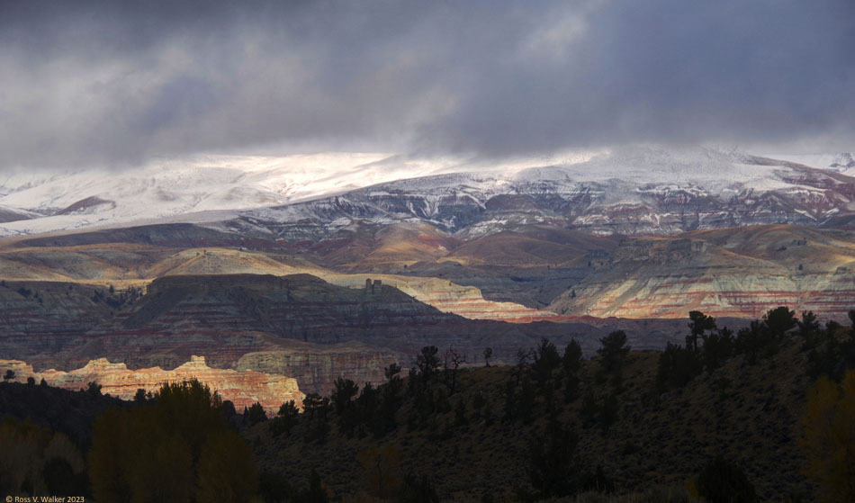 Storm light on the Dubois badlands and Absaroka mountains, Wyoming