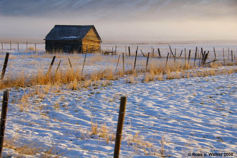 Morning mist around a barn on the edge of town in Montpelier, Idaho.