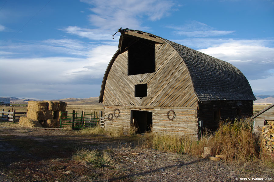 A classic arch roof log barn in Lanark, Idaho.