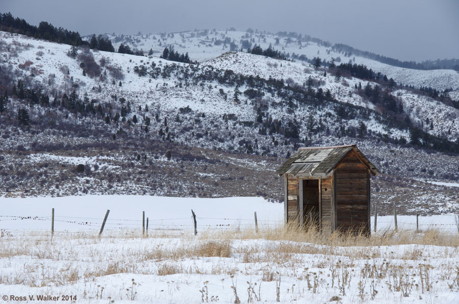 A lonely outhouse in Nounan, Idaho.