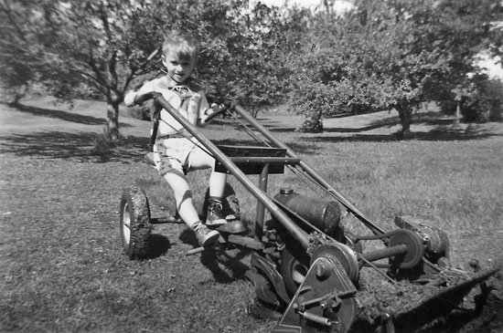 Gary Walker mowing the back yard, Sandy Hook, Connecticut
