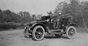Walter Luttgen in an antique car