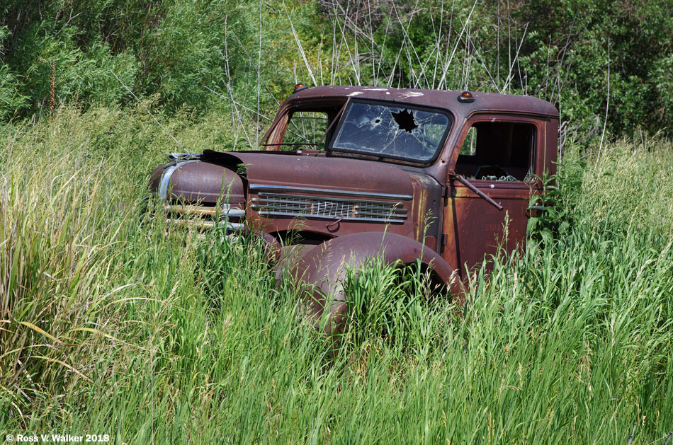 A sinking Diamond T flatbed in the Gem Valley area near Chesterfield, Idaho