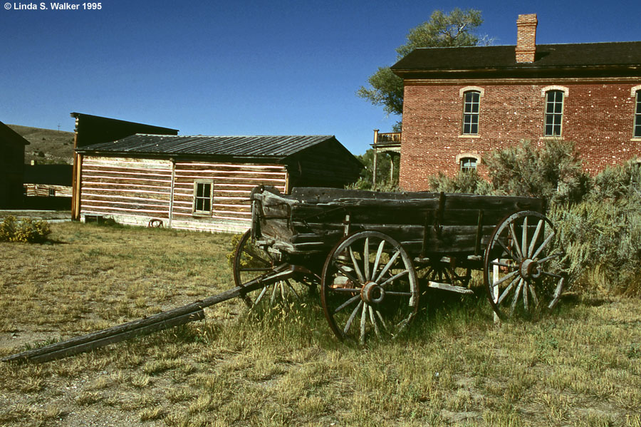 Wagon and the Meade Hotel, Bannack, Montana