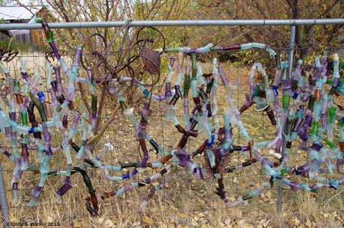 Broken bottles decorate fences in Tuscarora, Nevada