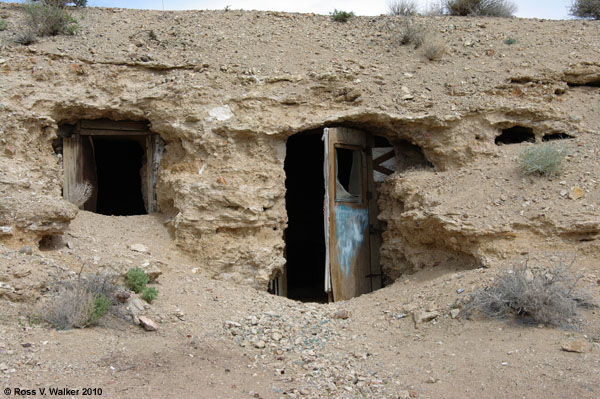 Dirt dugout in Darwin, California