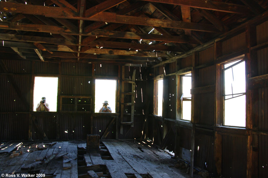 Photographers, interior of a building at Alberta Mine, White Knob Mountain, Idaho